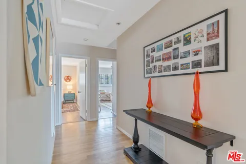 a room with furniture and wooden floor