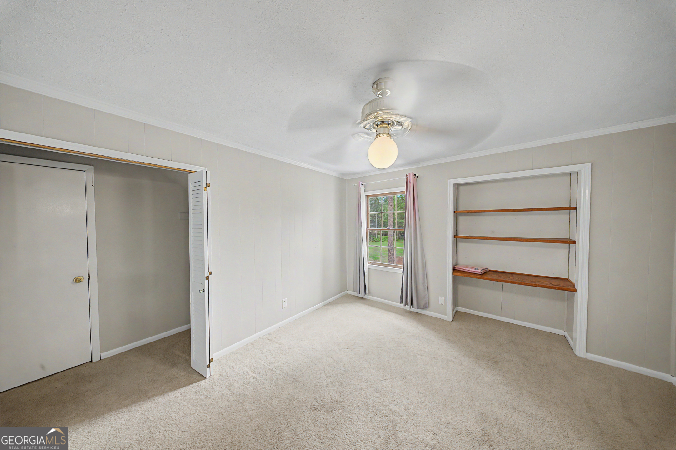 306 Holly Trail Moultrie, GA 31768 - Photo 23 of 40 a view of an empty room with a window
