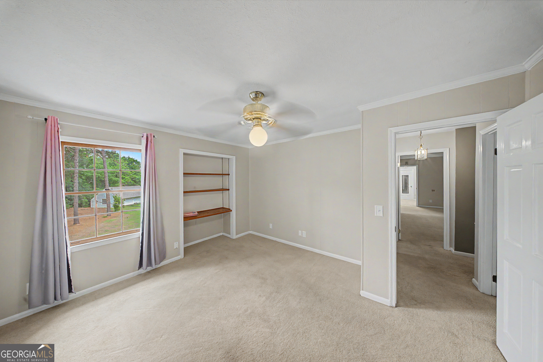306 Holly Trail Moultrie, GA 31768 - Photo 24 of 40 wooden floor in an empty room with a window