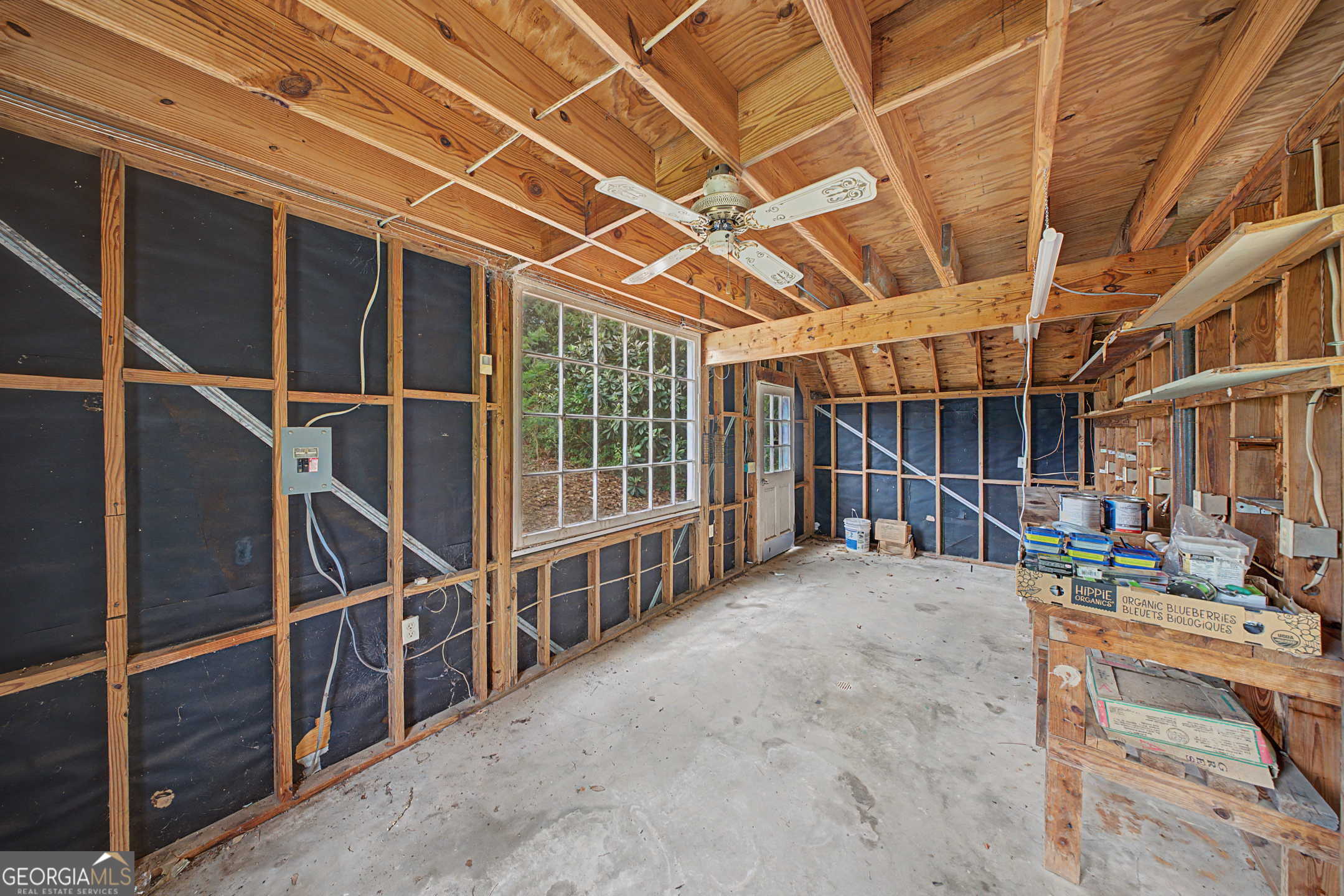 306 Holly Trail Moultrie, GA 31768 - Photo 31 of 40 a view of an empty room with wooden walls