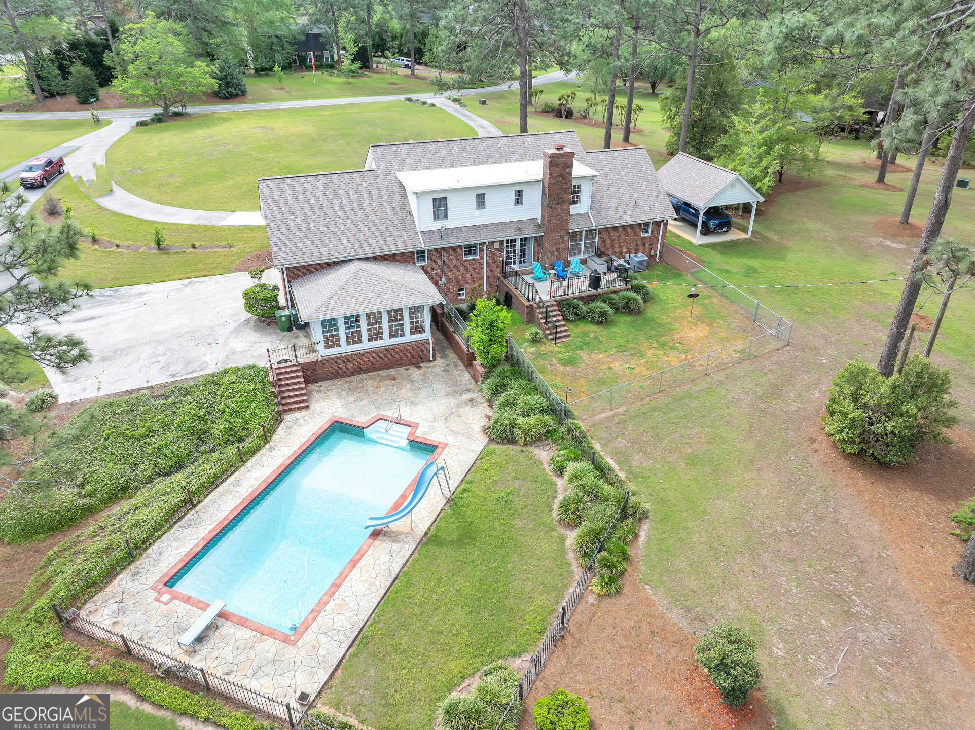 306 Holly Trail Moultrie, GA 31768 - Photo 39 of 40 a view of a house with a yard and a patio