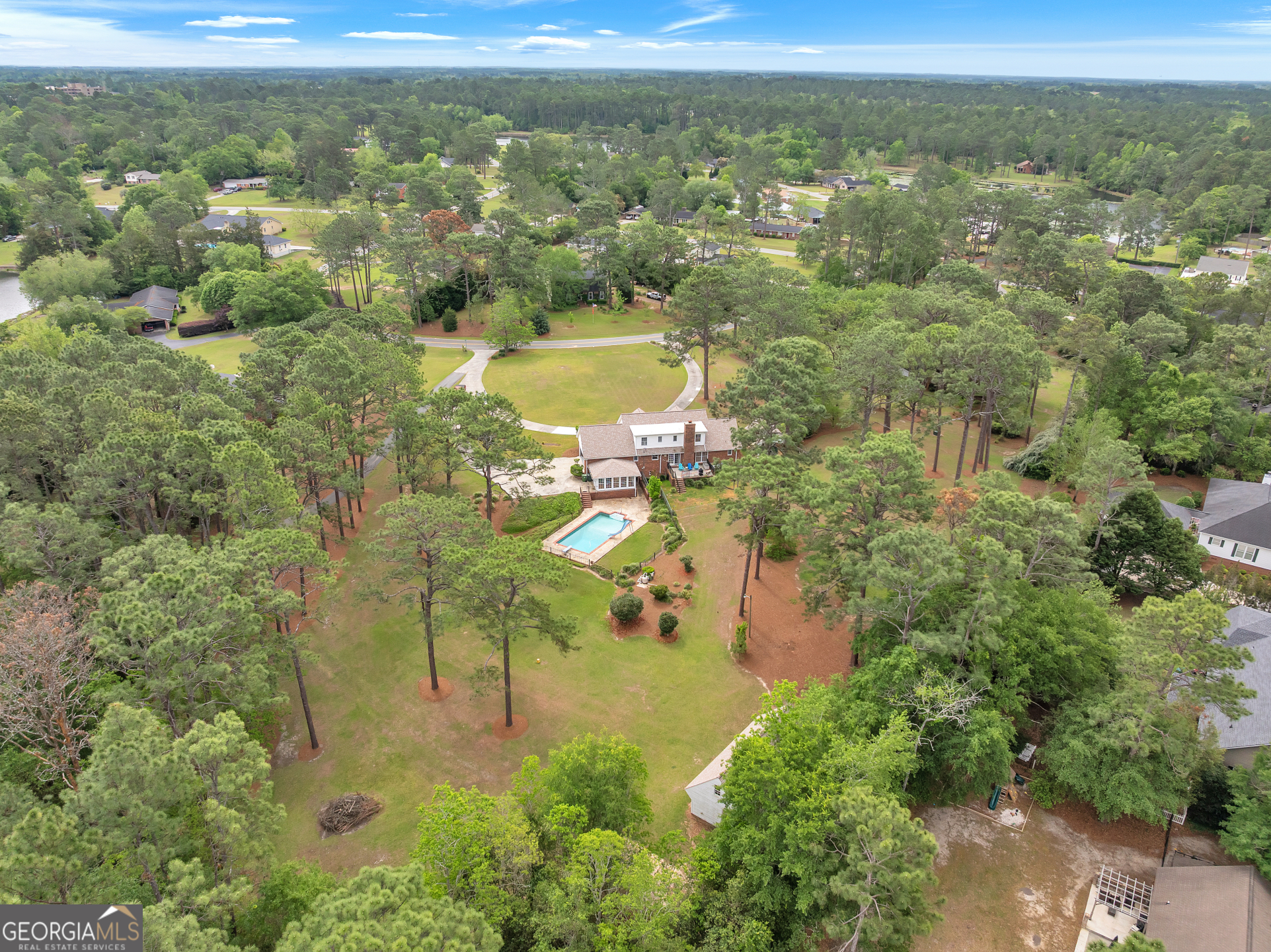 306 Holly Trail Moultrie, GA 31768 - Photo 40 of 40 an aerial view of residential houses with outdoor space and trees