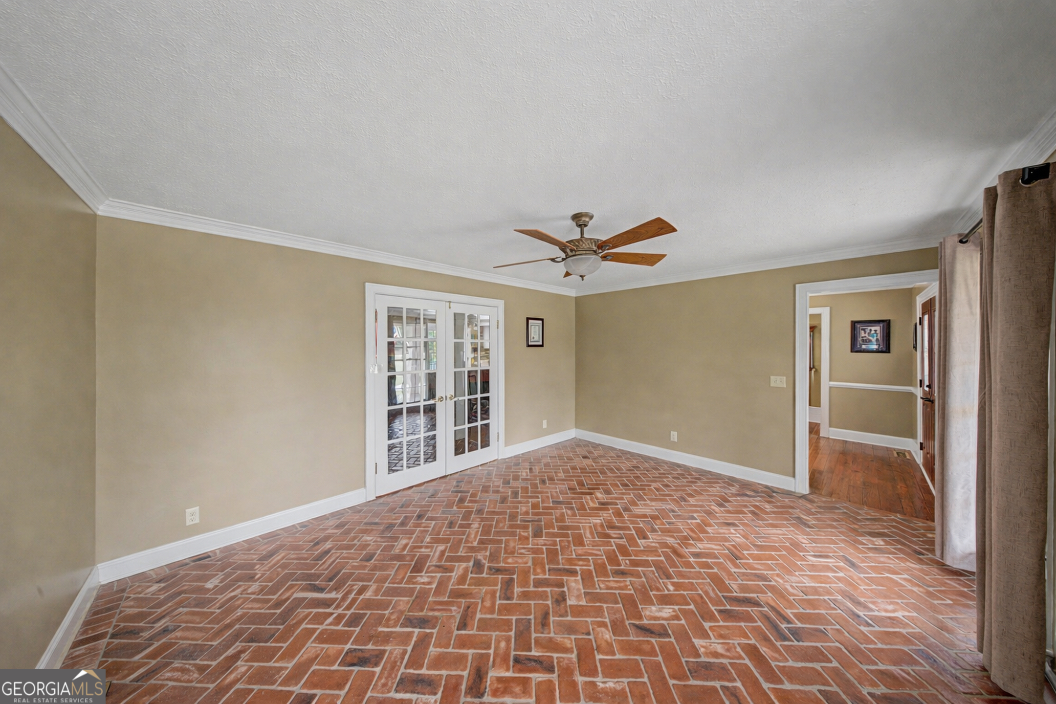 306 Holly Trail Moultrie, GA 31768 - Photo 5 of 40 a view of empty room with windows