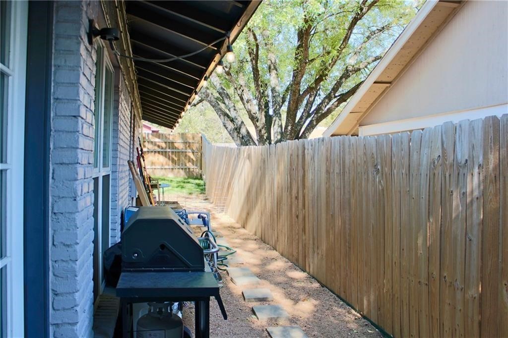 1511 Rutland Drive, Unit A Austin, TX 78758 - Photo 12 of 16 a view of a chairs and table in the balcony
