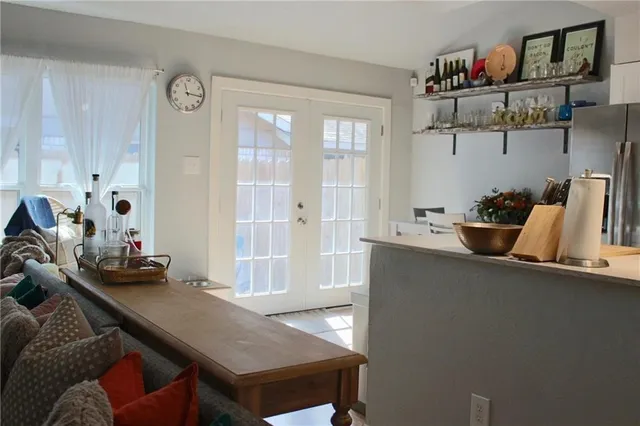 a room with furniture and a book shelf