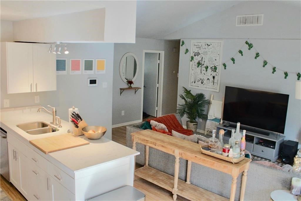 1511 Rutland Drive, Unit A Austin, TX 78758 - Photo 6 of 16 a bathroom with a sink and a mirror
