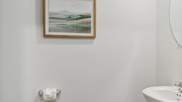 a bathroom with a sink and mirror