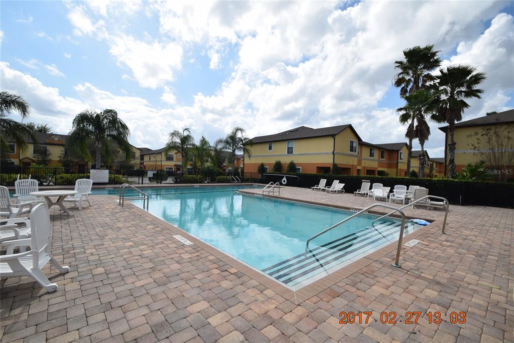 5221 Windsor Lake Circle Sanford, FL 32773 - Photo 13 of 15 an outdoor space with swimming pool and furniture
