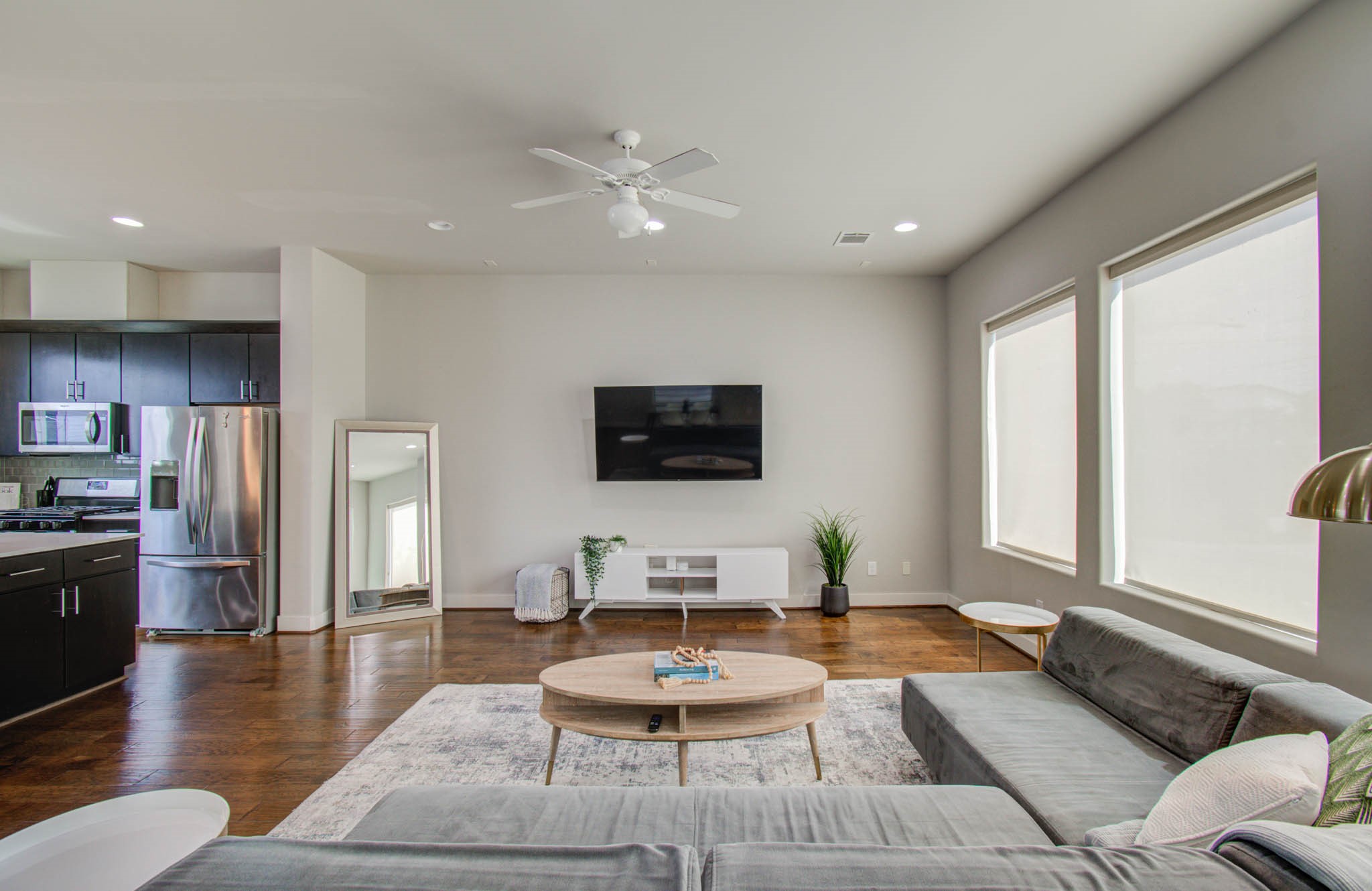509 Gregg Street Houston, TX 77020 - Photo 16 of 38 a living room with furniture a rug and a flat screen tv