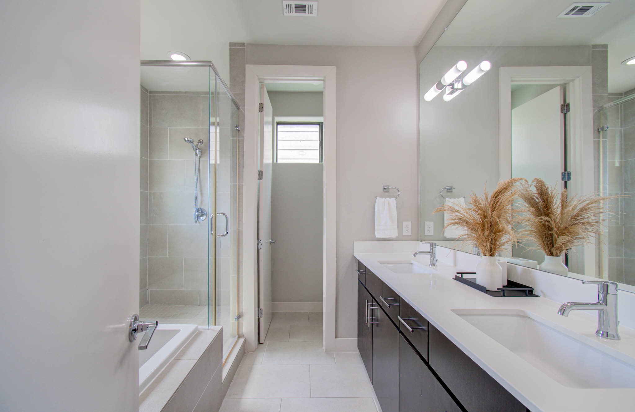 509 Gregg Street Houston, TX 77020 - Photo 30 of 38 a bathroom with a sink double vanity and a mirror