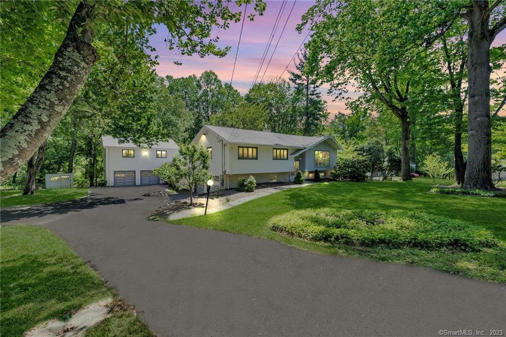 a house view with a garden space