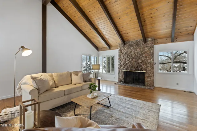 a kitchen with a sink a stove and cabinets