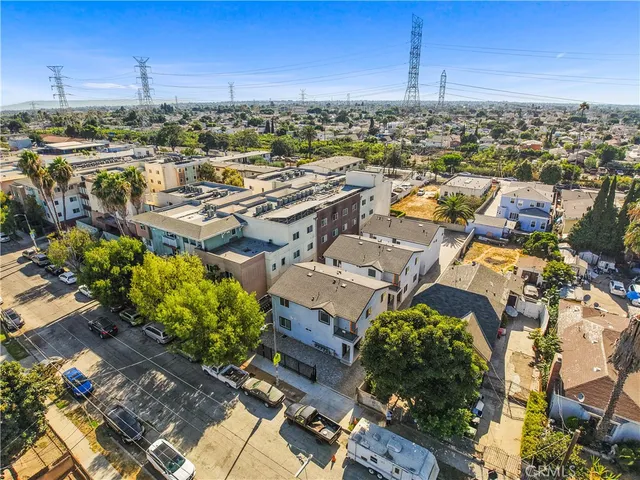 an aerial view of a building with outdoor space