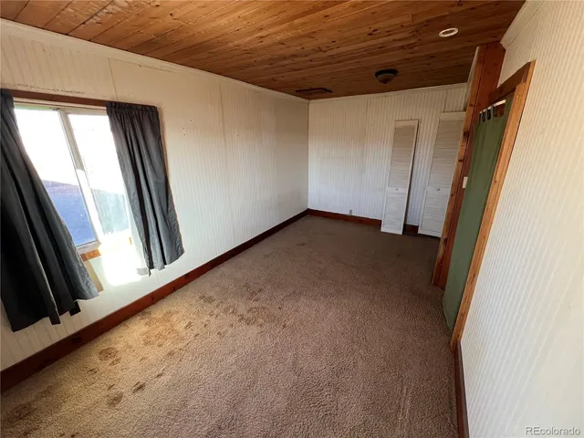 a view of a livingroom with chairs