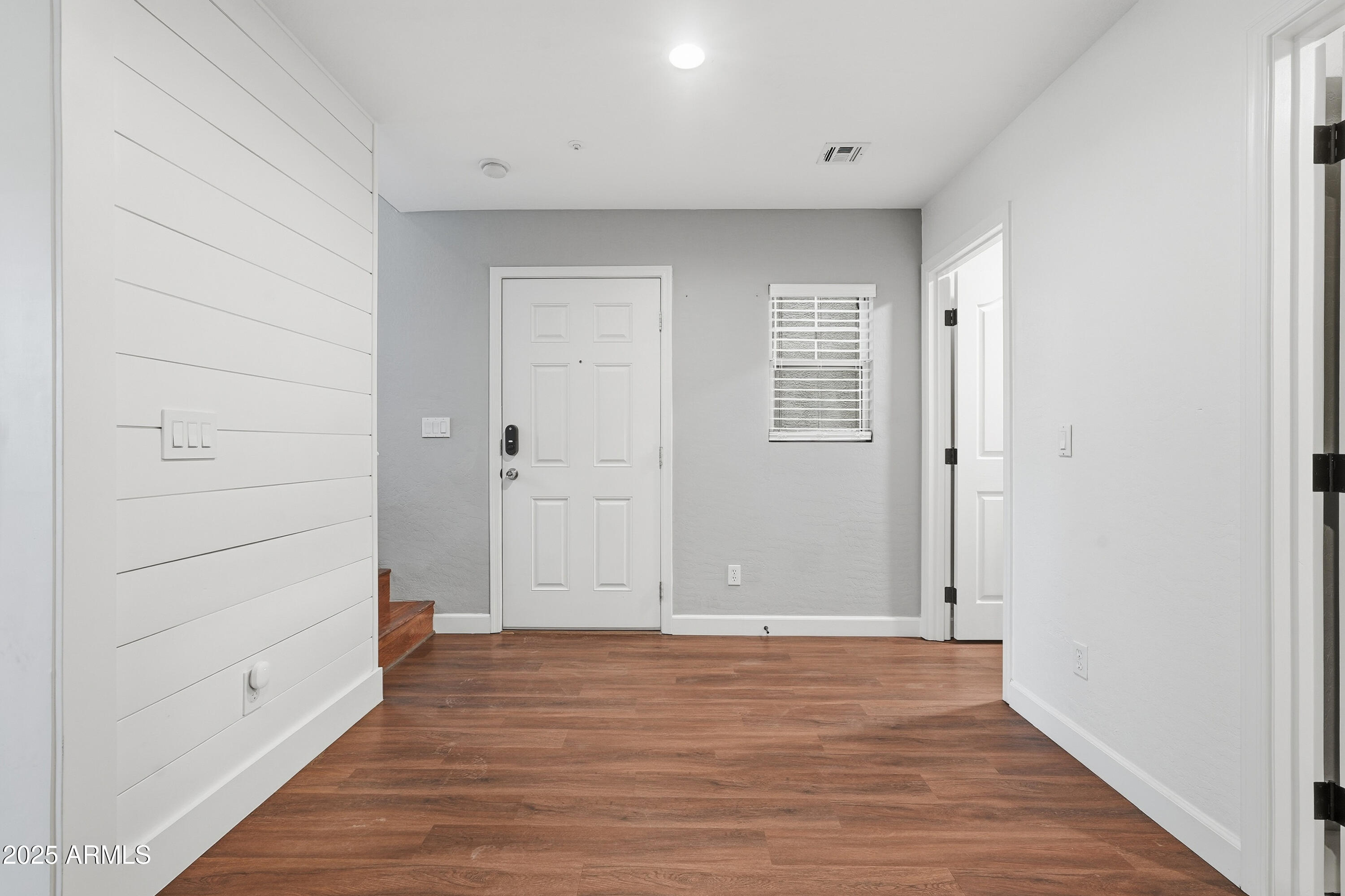 162 West Commerce Court Gilbert, AZ 85233 - Photo 3 of 29 wooden floor in an empty room