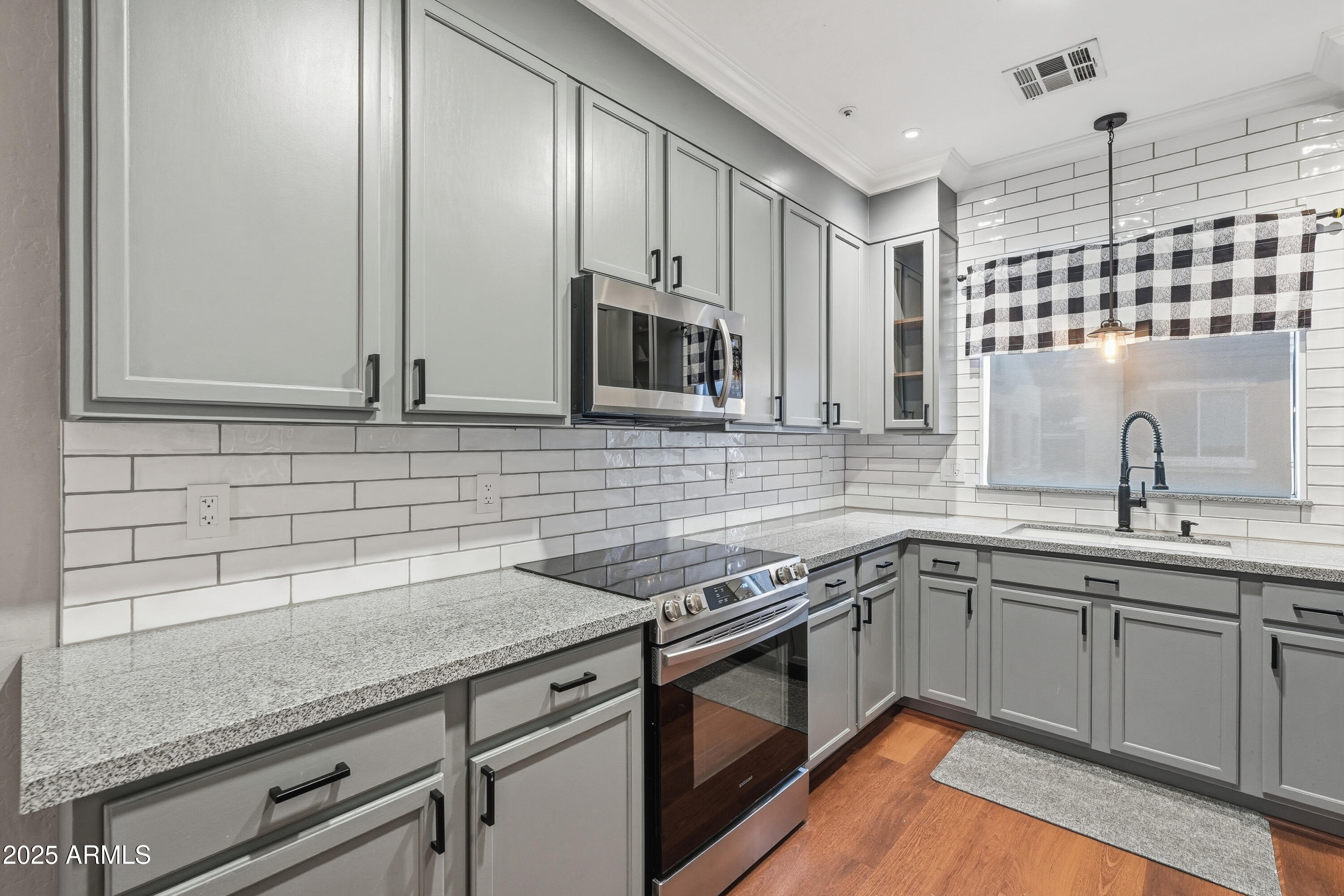 162 West Commerce Court Gilbert, AZ 85233 - Photo 10 of 29 a kitchen with a sink and cabinets