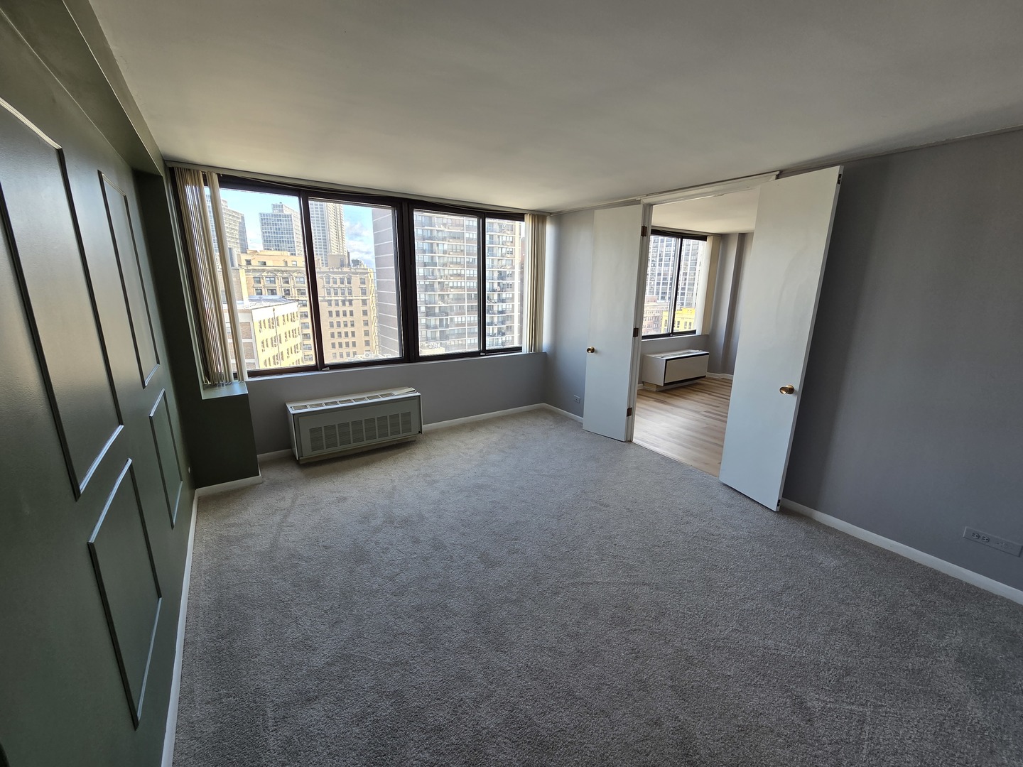 2754 North Hampden Court, Unit 1407 Chicago, IL 60614 - Photo 11 of 23 a view of an empty room with large window