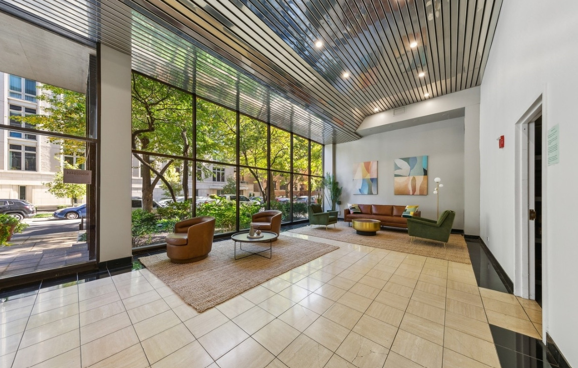 2754 North Hampden Court, Unit 1407 Chicago, IL 60614 - Photo 19 of 23 a lobby with furniture and floor to ceiling window