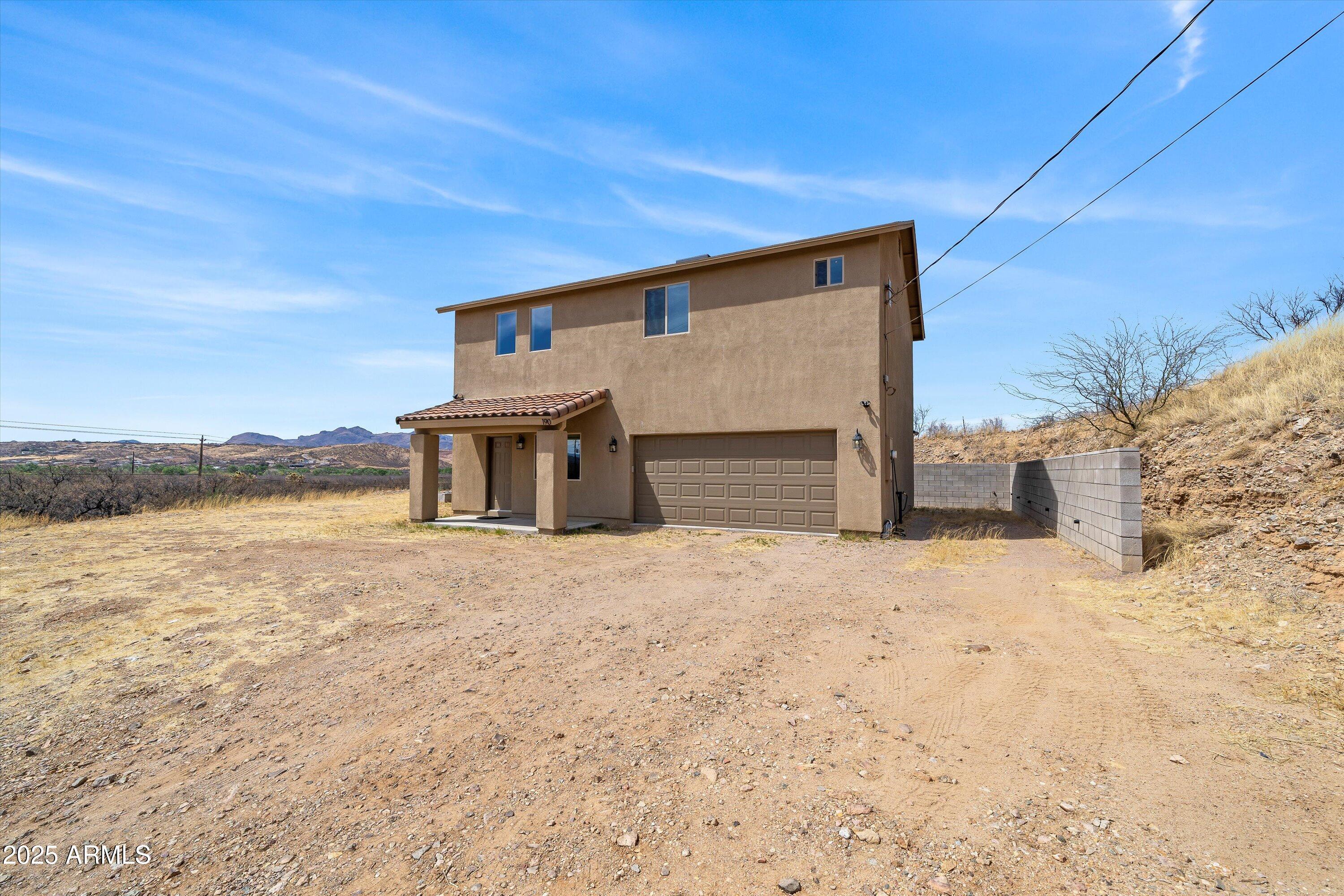 190 Círculo Silva Rio Rico, AZ 85648 - Photo 2 of 28 01-Front of Home