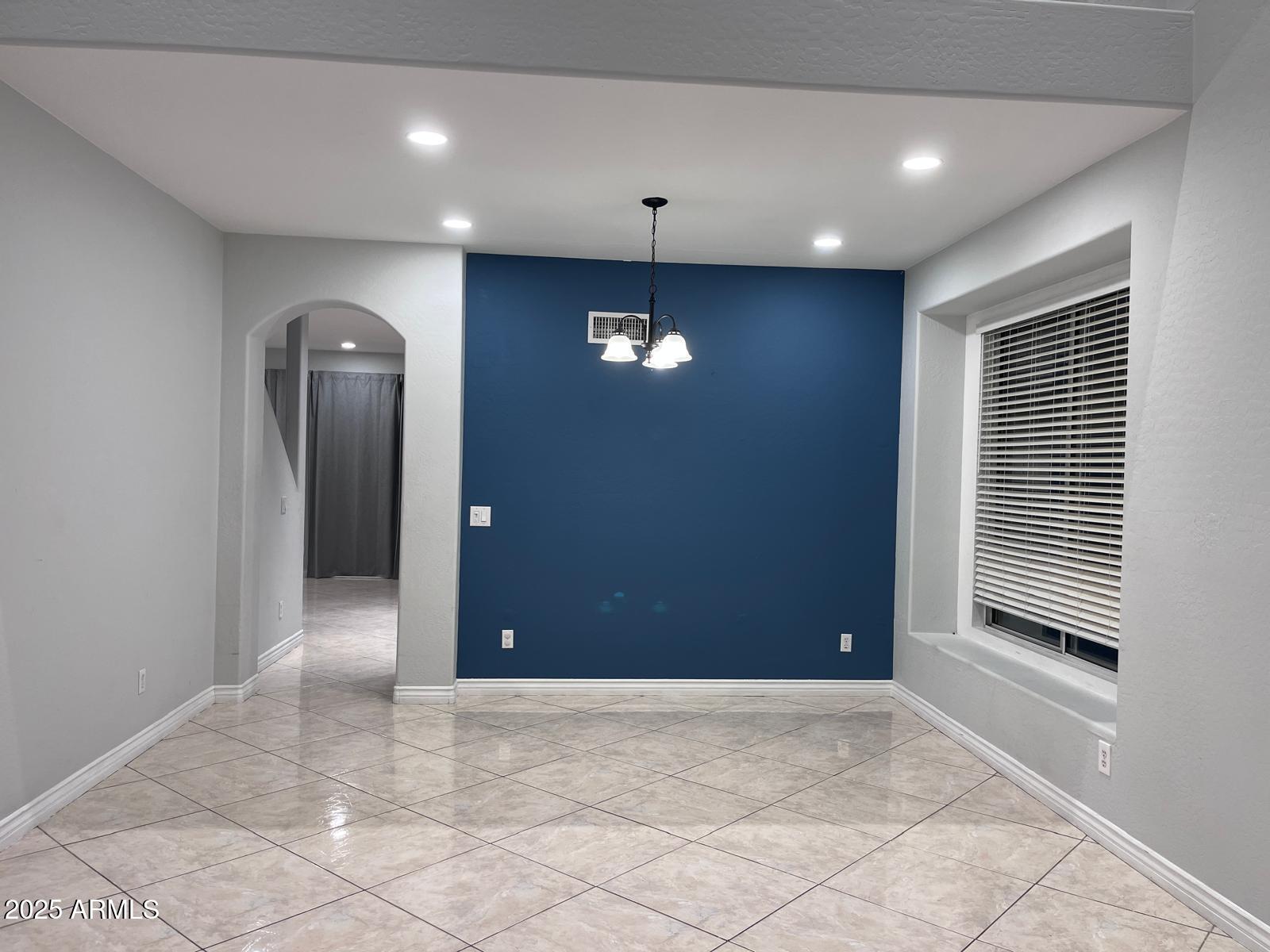 18835 North 16th Place Phoenix, AZ 85024 - Photo 14 of 18 a view of a hallway with wooden floor