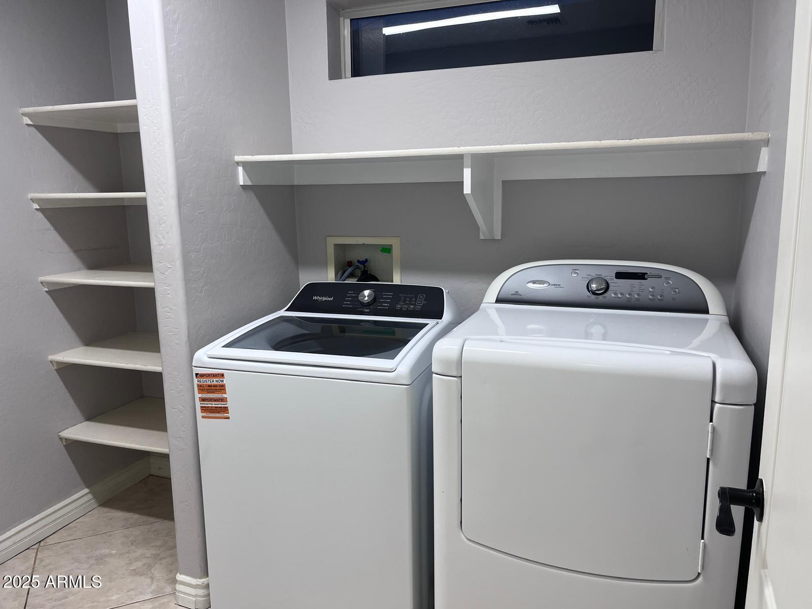 18835 North 16th Place Phoenix, AZ 85024 - Photo 18 of 18 a utility room with dryer and washer
