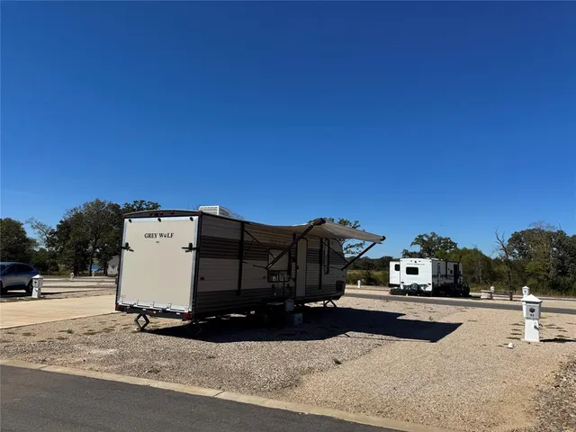 a view of street with parked cars