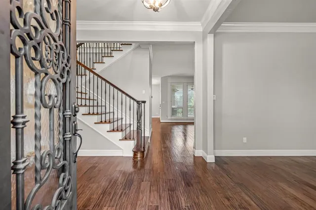 a view of entryway with wooden floor