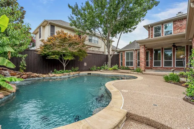 a view of a house with a swimming pool