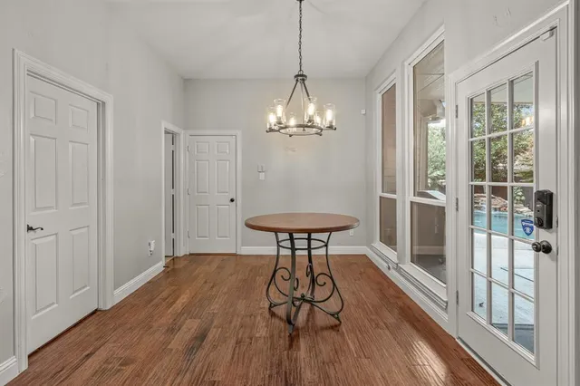 a room with furniture and a chandelier