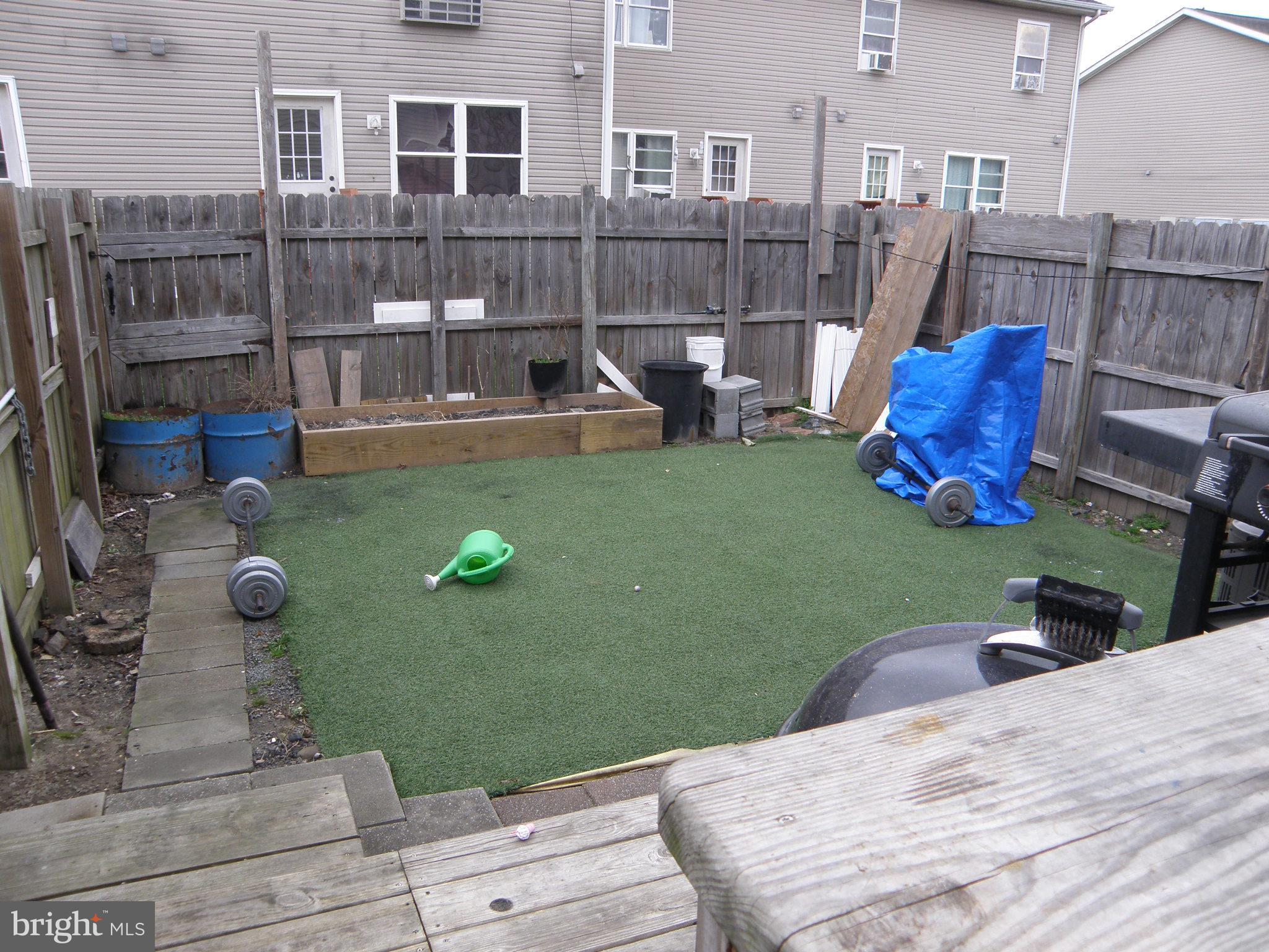 28 West North Street Georgetown, DE 19947 - Photo 12 of 13 Deck and Fenced Back Yard