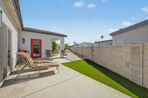 a view of yard with patio