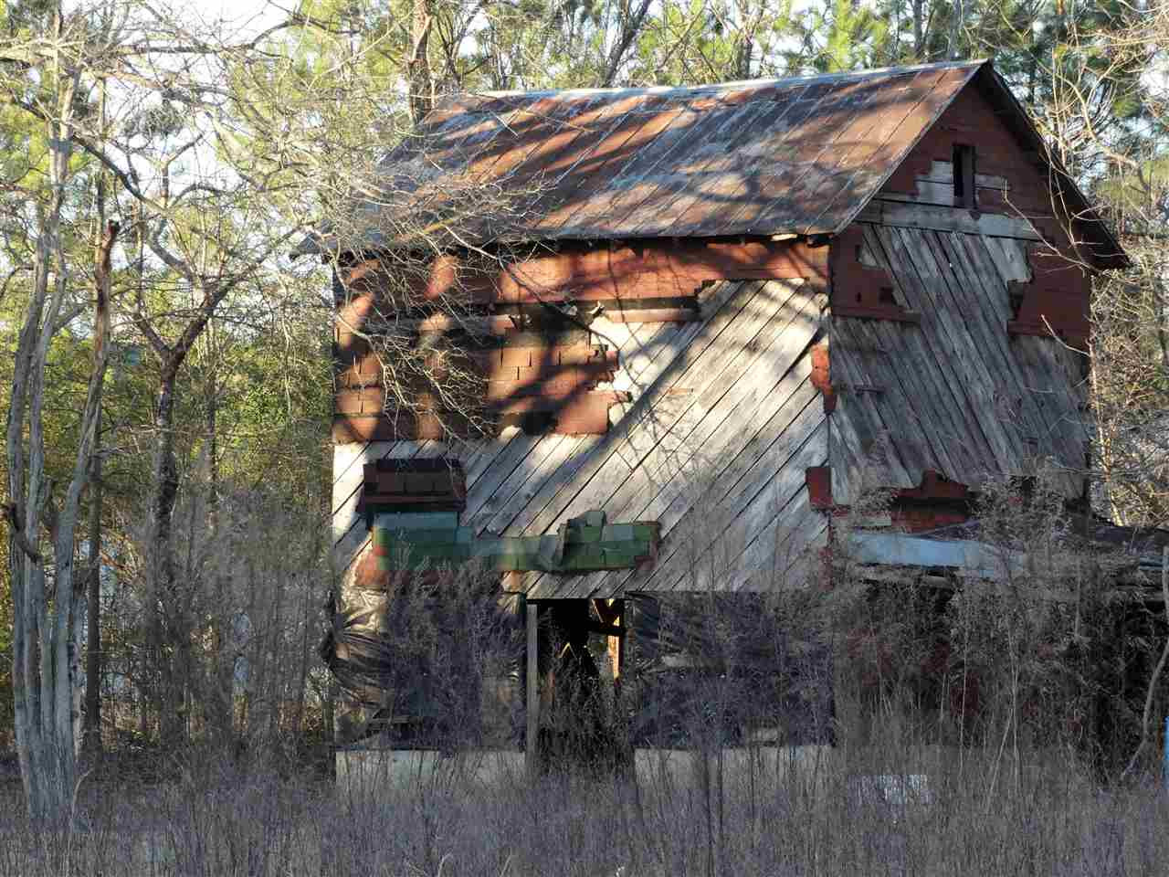 186 Swift Creek Road Smithfield, NC 27577 - Photo 18 of 18 Old Tobacco Barn with possibility of being restored