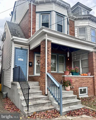 front view of a house with a small window