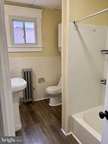 a bathroom with a sink and a toilet