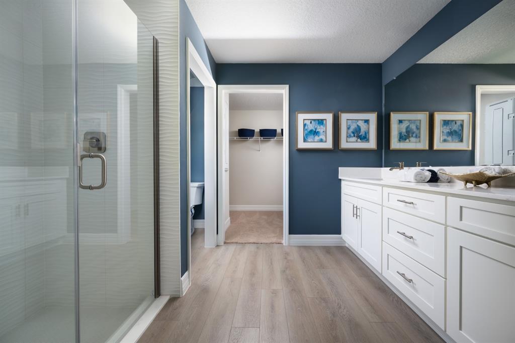 6144 Southwest 97th Street Ocala, FL 34476 - Photo 13 of 33 a bathroom with a double vanity sink and mirror