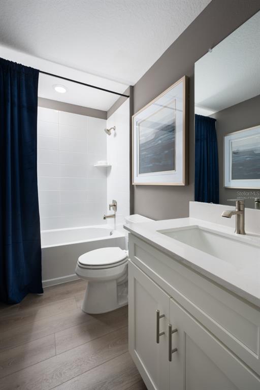 6144 Southwest 97th Street Ocala, FL 34476 - Photo 22 of 33 a bathroom with a sink a toilet and a bathtub