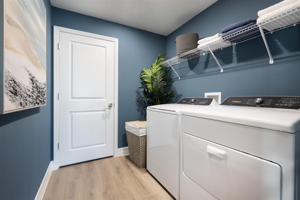 6144 Southwest 97th Street Ocala, FL 34476 - Photo 25 of 33 a utility room with dryer and washer