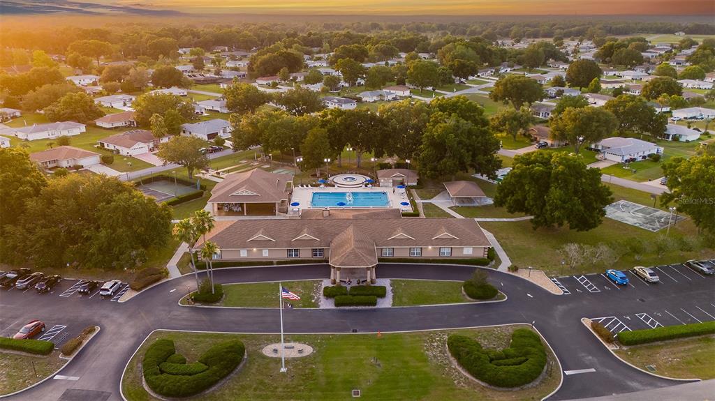 6144 Southwest 97th Street Ocala, FL 34476 - Photo 28 of 33 an aerial view of a house with yard swimming pool and outdoor space