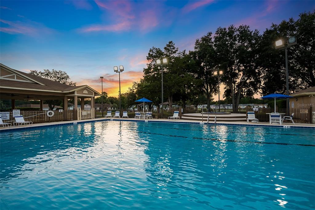 6144 Southwest 97th Street Ocala, FL 34476 - Photo 31 of 33 a view of house with swimming pool yard and outdoor seating