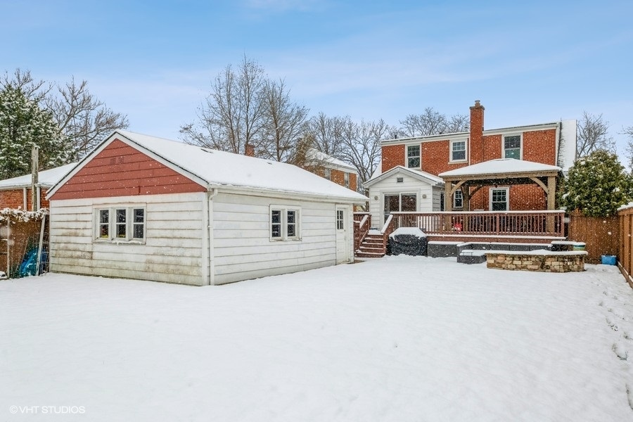 130 Northgate Road Riverside, IL 60546 - Photo 13 of 18 a view of a house with a yard