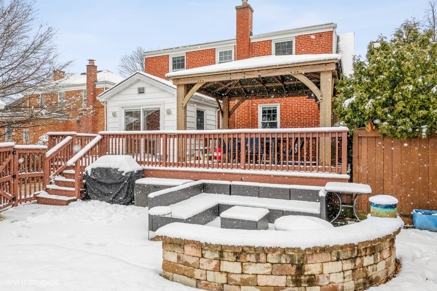 130 Northgate Road Riverside, IL 60546 - Photo 14 of 18 a front view of a house with outdoor seating