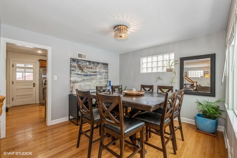 130 Northgate Road Riverside, IL 60546 - Photo 4 of 18 a view of a dining room with furniture and wooden floor