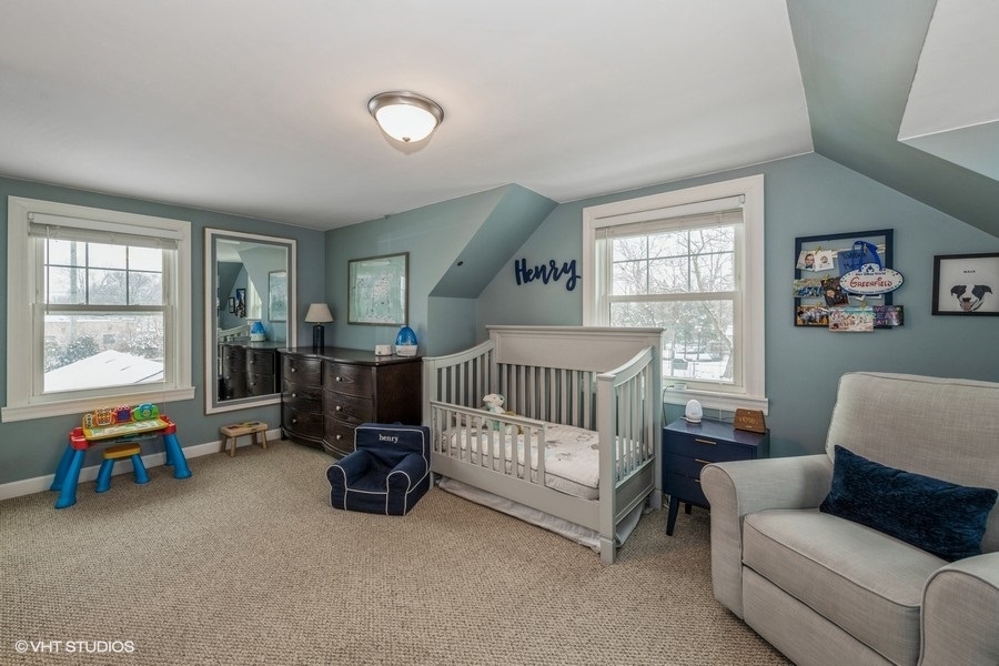 130 Northgate Road Riverside, IL 60546 - Photo 10 of 18 a bedroom with furniture and a window