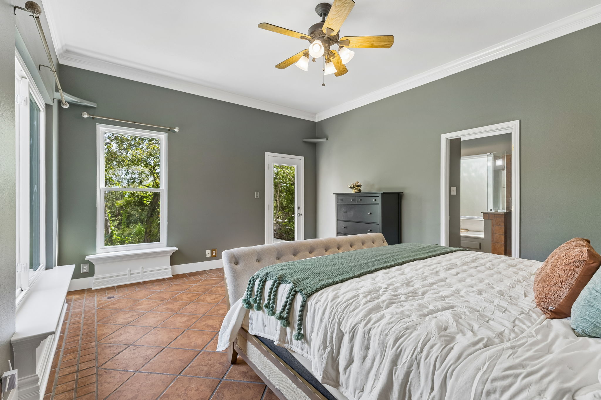 13209 North Ridge Circle Leander, TX 78641 - Photo 20 of 39 Large primary bedroom w/ views of ponds and outdoor space