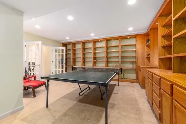 a view of a room with furniture window and wooden floor