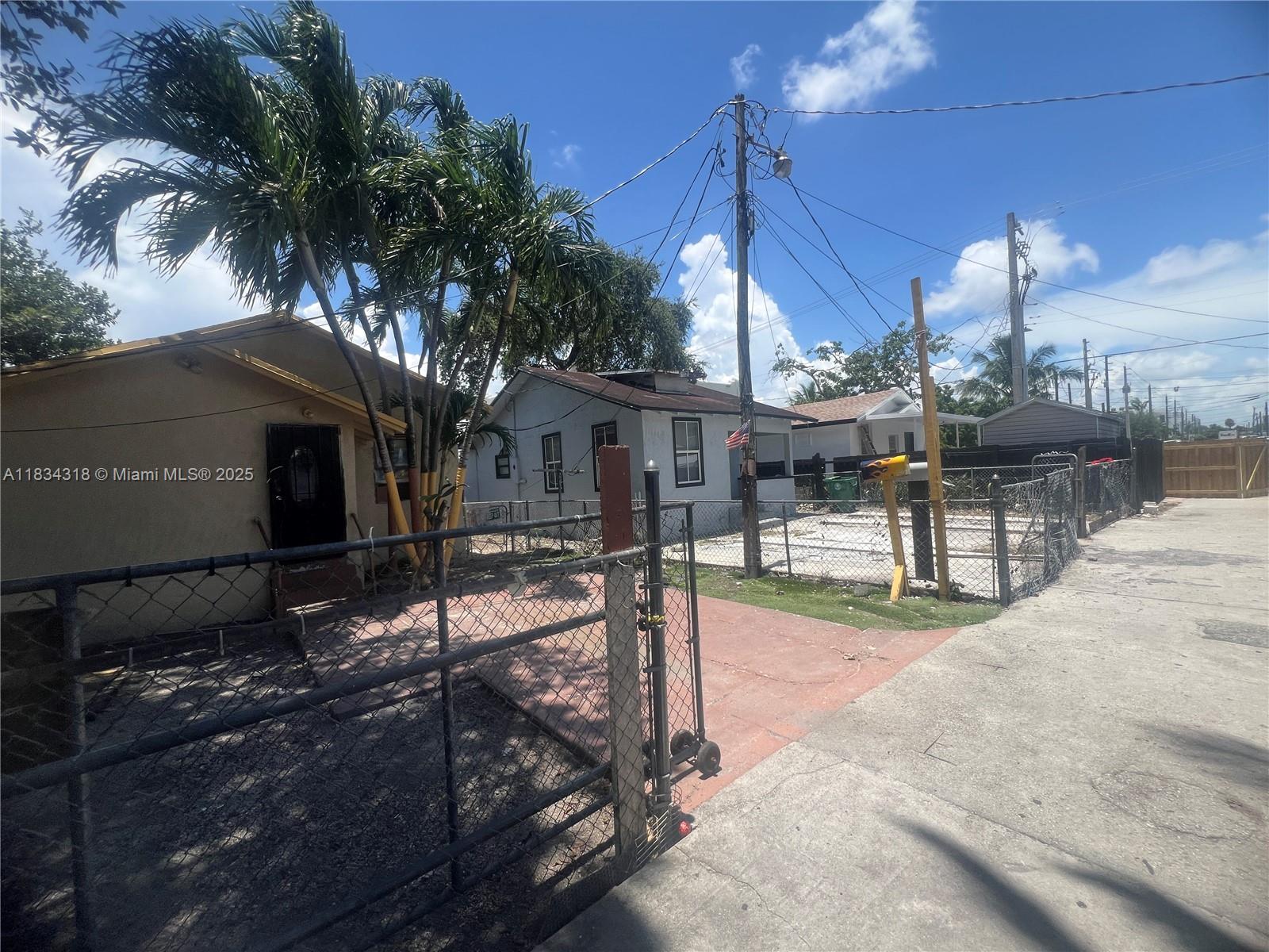 1800 Southwest 3rd Street, Unit C Miami, FL 33135 - Photo 4 of 13 a view of a house with backyard porch and sitting area