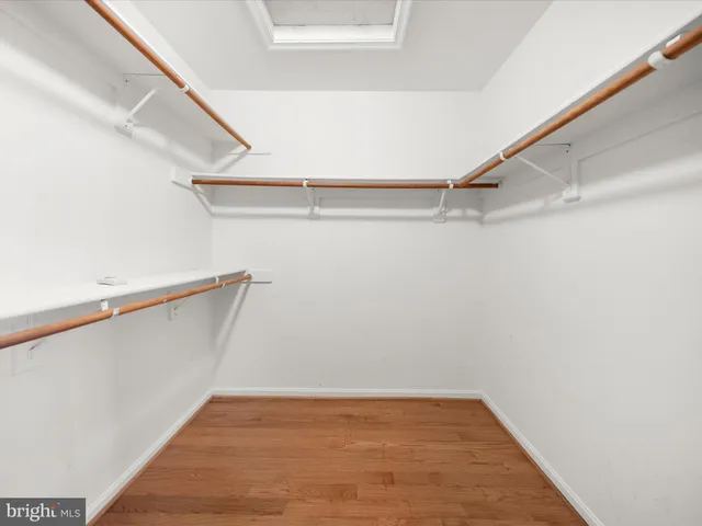 a view of an empty walk in closet