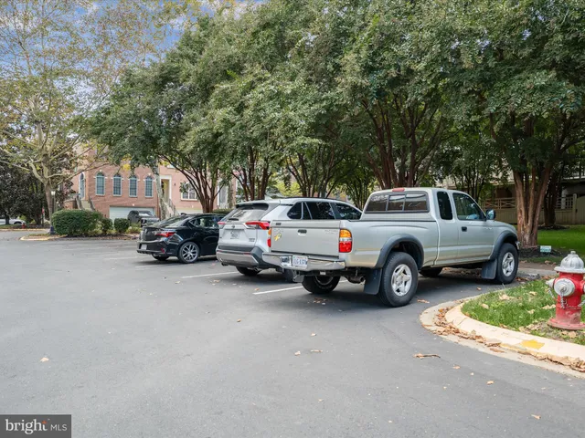 a view of a cars parked in front of a building