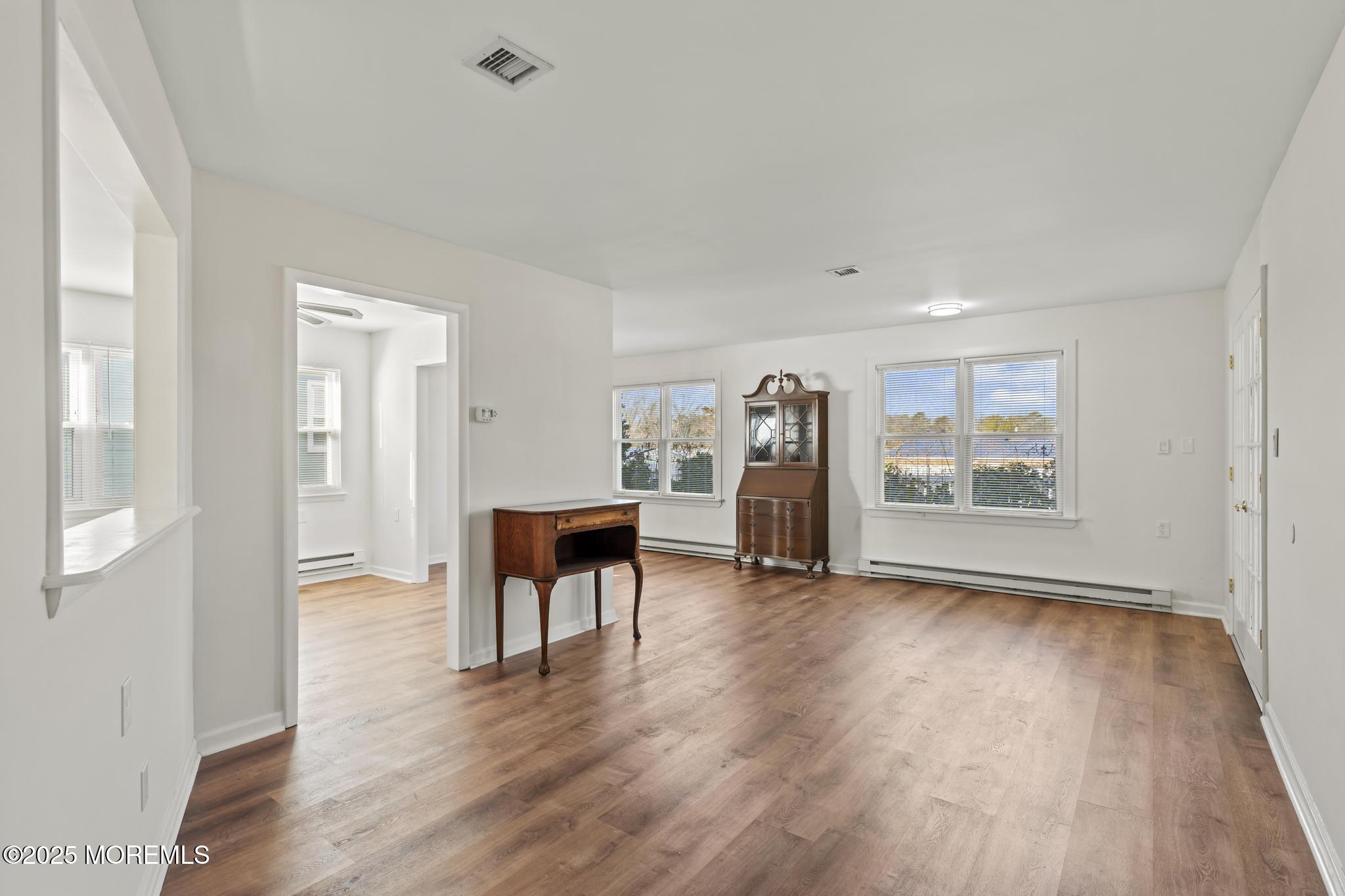 43 Patmore Road Brick, NJ 08724 - Photo 19 of 36 wooden floor in an empty room with a window