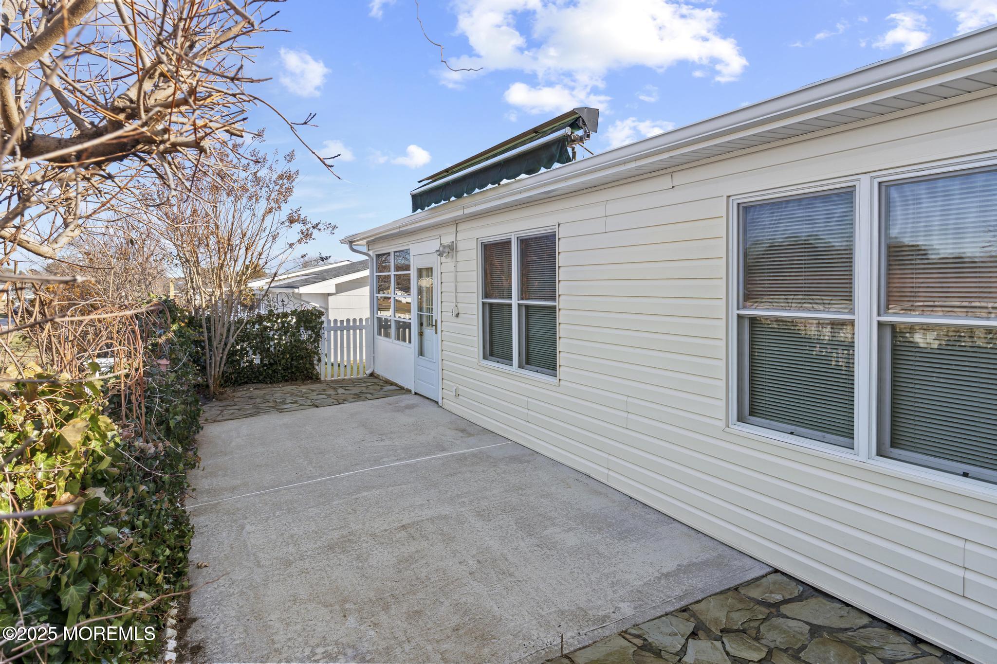 43 Patmore Road Brick, NJ 08724 - Photo 31 of 36 a view of house with backyard and glass windows